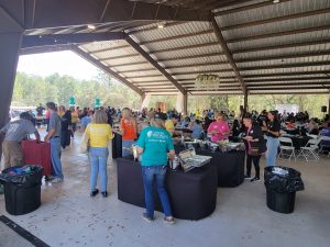 company employees lining up for lunch organized by RH Events & Catering