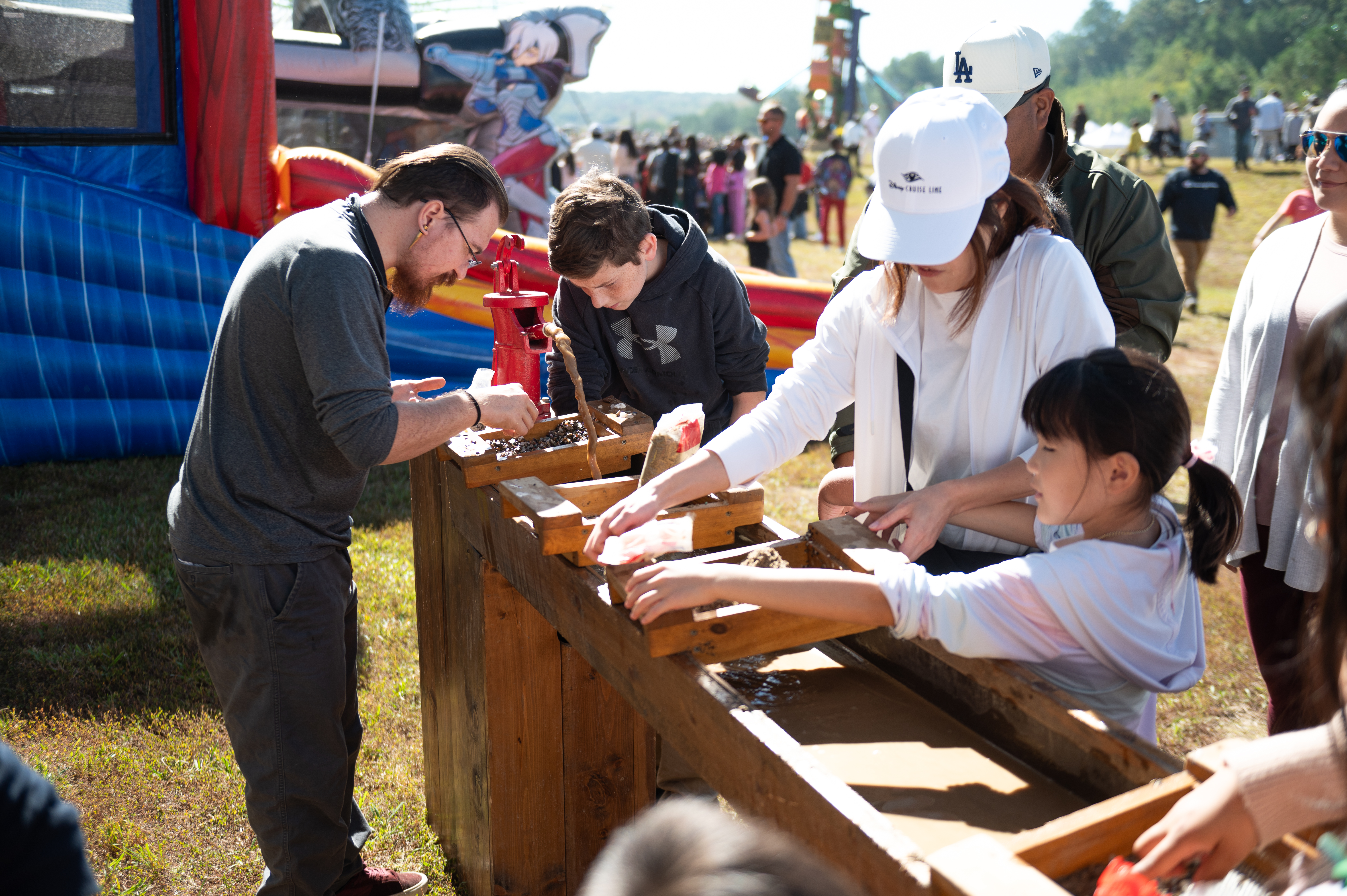 employees and their families enjoying a large-scale event