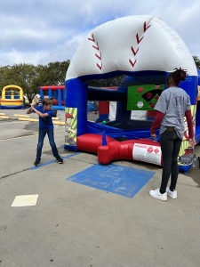 Inflatable baseball game at company picnic