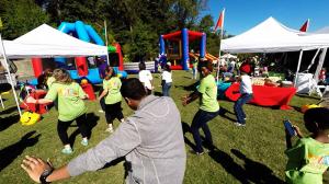 People dancing at a Company Picnic